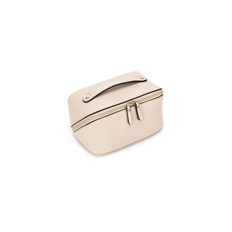 A oatmeal-colored makeup bag with a two-way zip closure, featuring a flat handle and gold hardware.