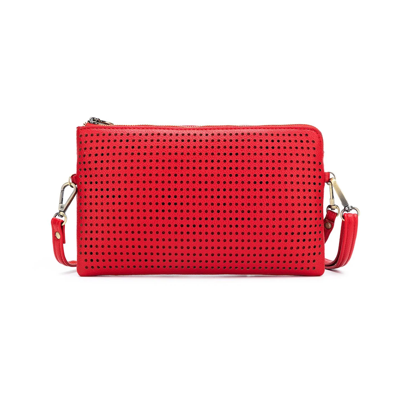 A red Nina crossbody clutch with a perforated front and a solid red back, displayed on a white background.