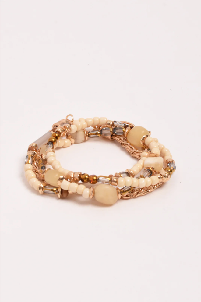 Set of beaded bracelets on a white background