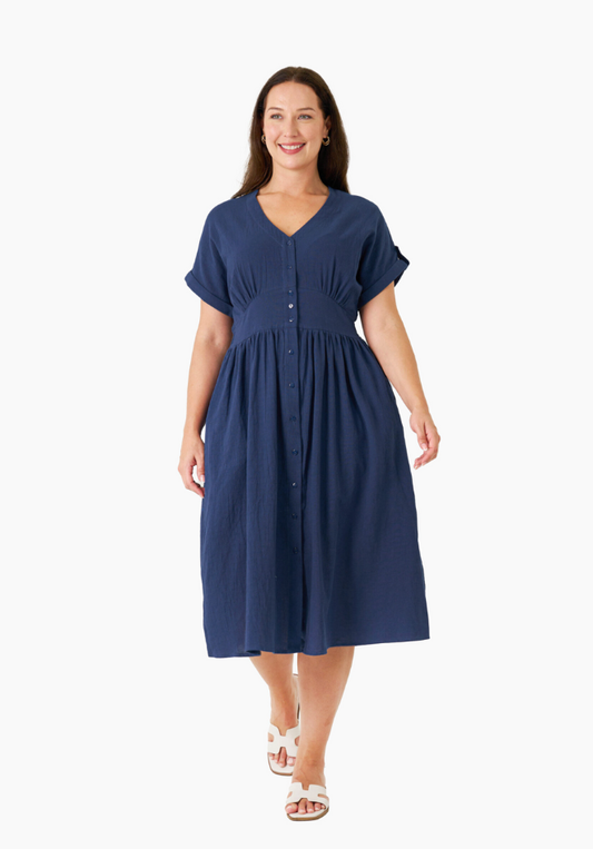 A navy, short-sleeved, V-neck dress with button front detail and side seam pockets, knee-length.