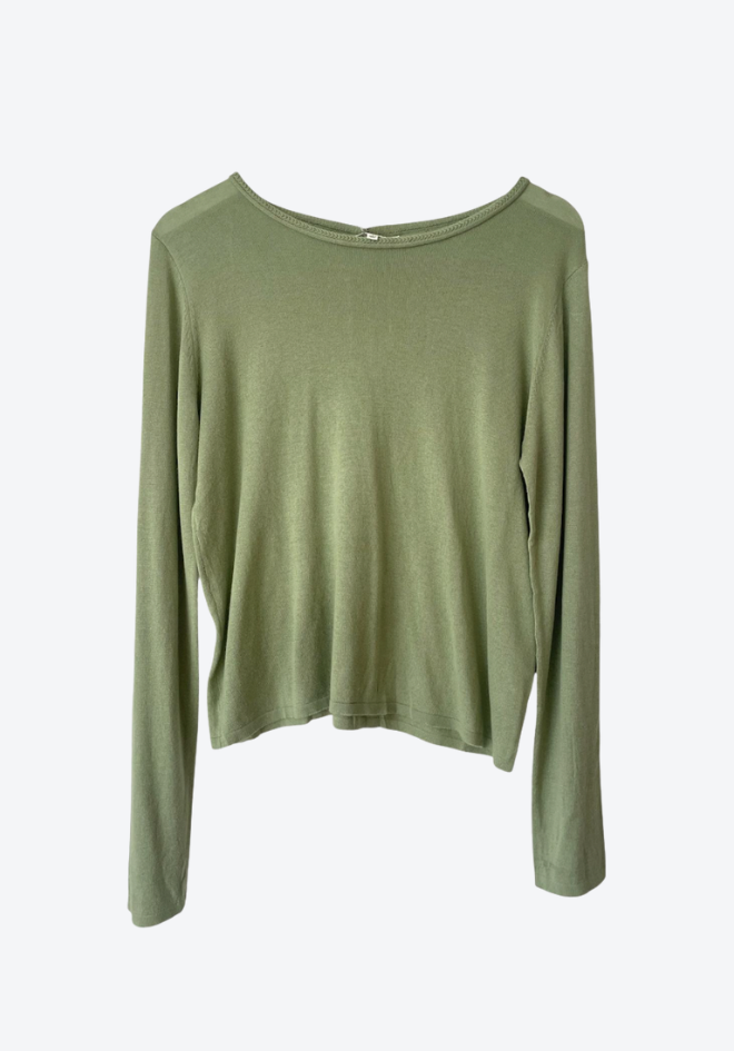 Green long-sleeve shirt on a white background