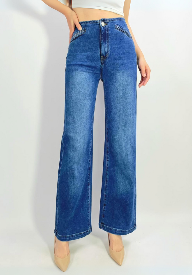Blue jeans worn by a person on a white background
