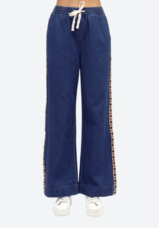 Blue wide-leg pants with a drawstring waistband on a white background