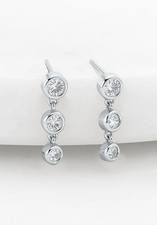 Silver earrings with multiple gemstones on a white background