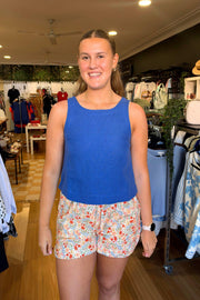 Little Lies Jude Top in Cobalt front view, worn with the Margot Shorts in floral print