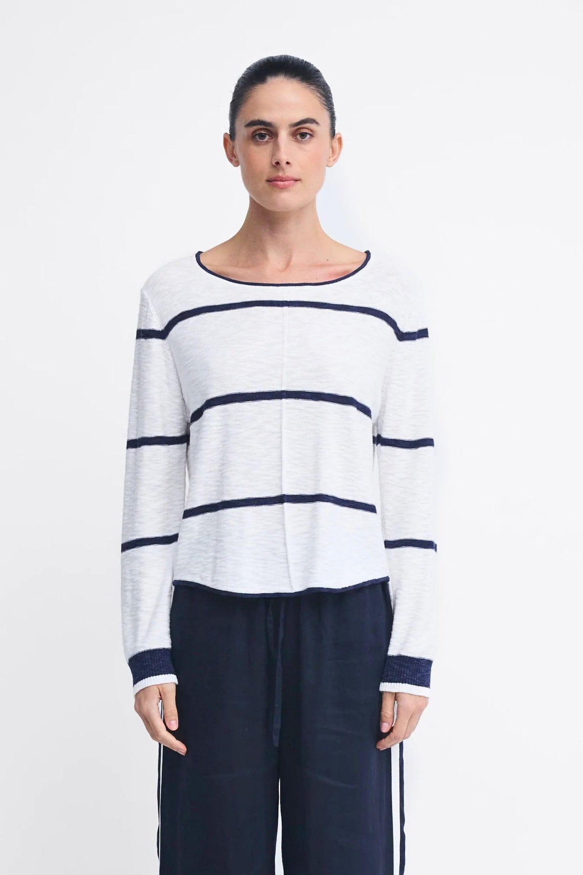 Monaco Pants Little Lies — model wearing navy wide-leg pants with white side stripes, styled with a white and navy striped top, available in Australia at Kat and Ko Clothing.