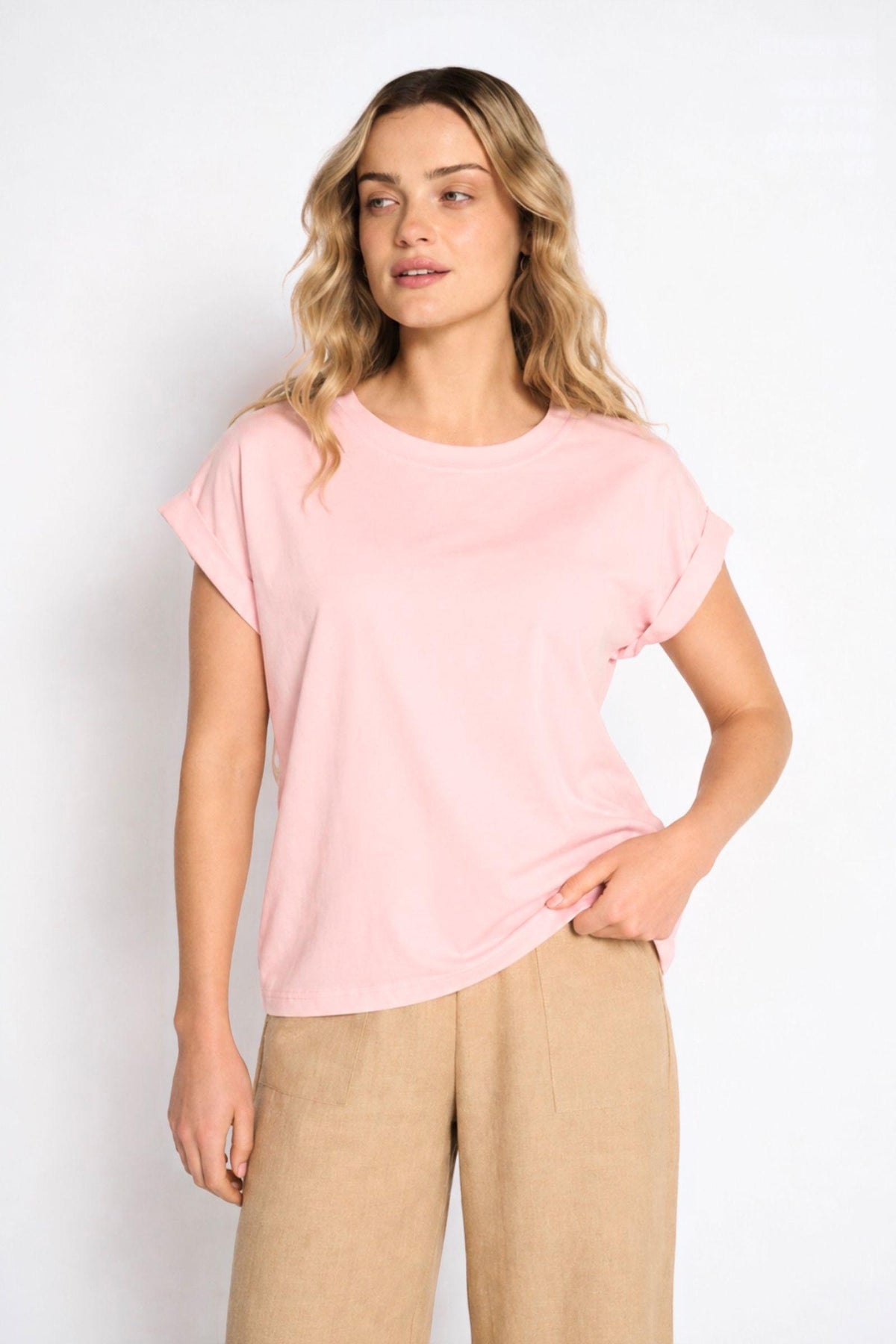 Rhodes Tee by Little Lies — front view of soft pink short sleeve tee with round neckline, styled with beige trousers, shop in Australia at Kat and Ko Clothing
