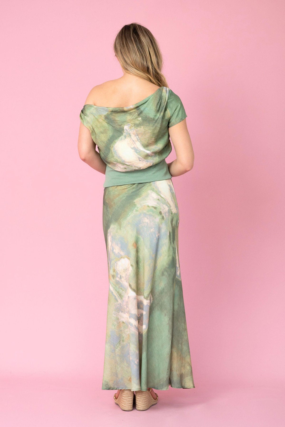 Fria The Label Dune Print Top and Maxi Skirt in Sage worn as a set, full-length back view