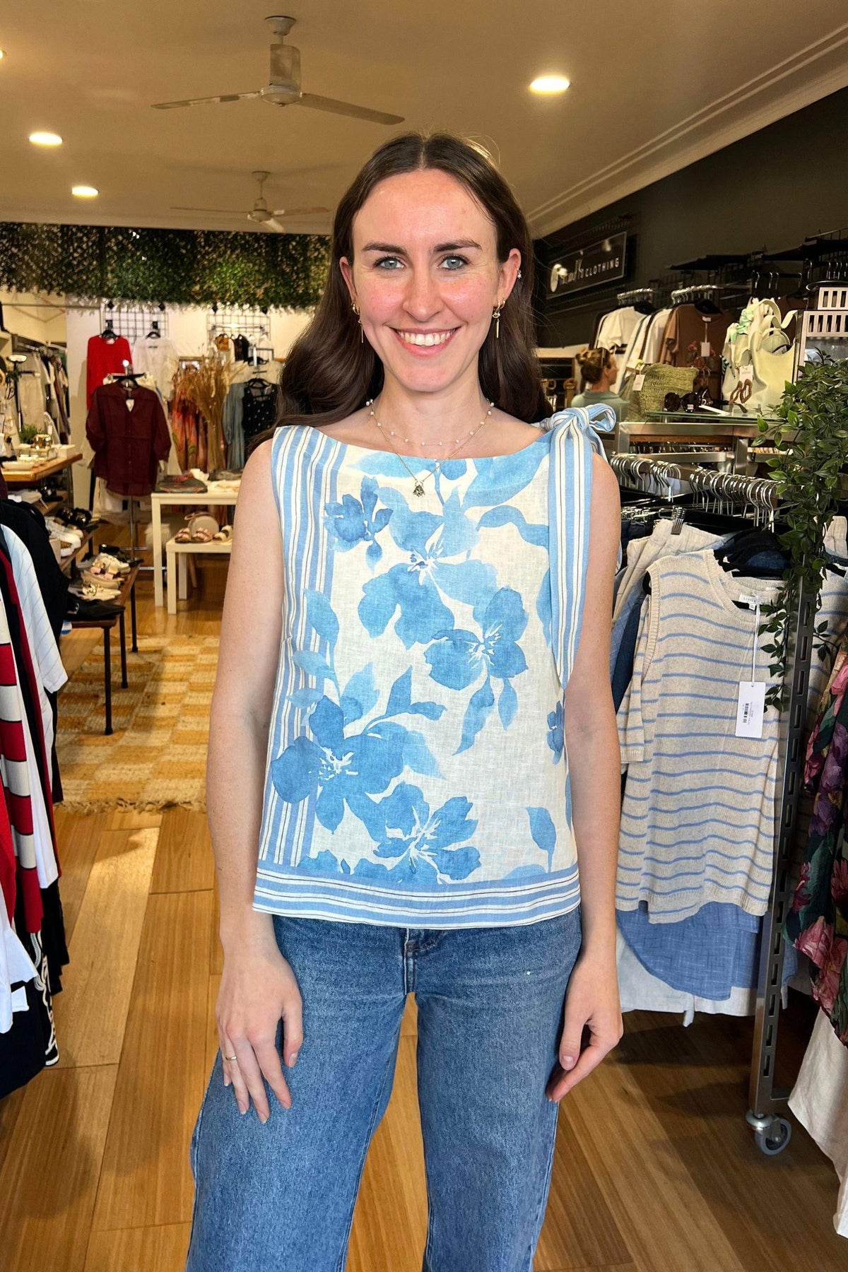 Delphine Linen Cami Little Lies — full-length view of model wearing blue floral print cami styled with jeans, available in Australia at Kat and Ko Clothing