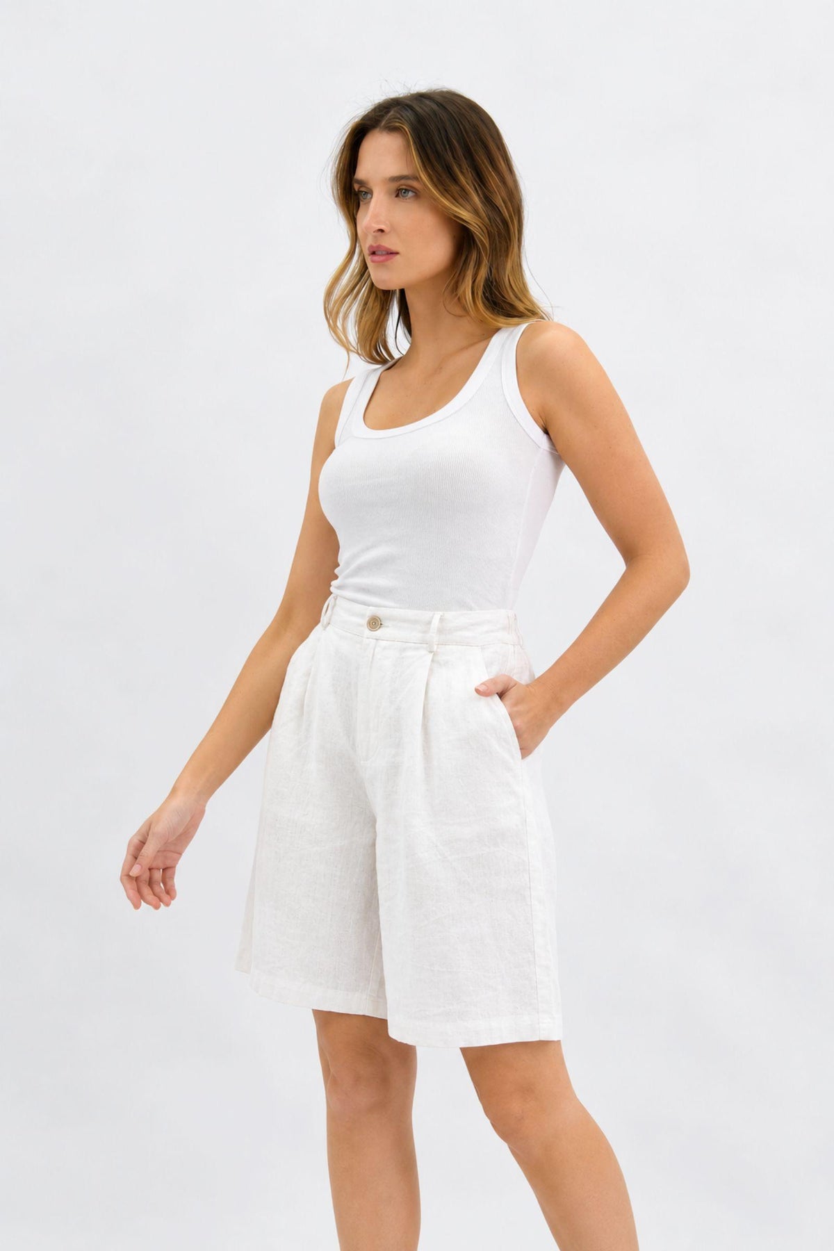 Worthier Carys Linen Bermuda Shorts in White, front view with a white singlet