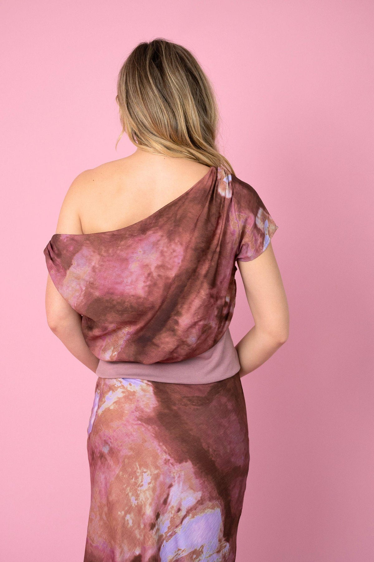 Fria The Label Dune Print Top in Rose back view of the asymmetric neckline