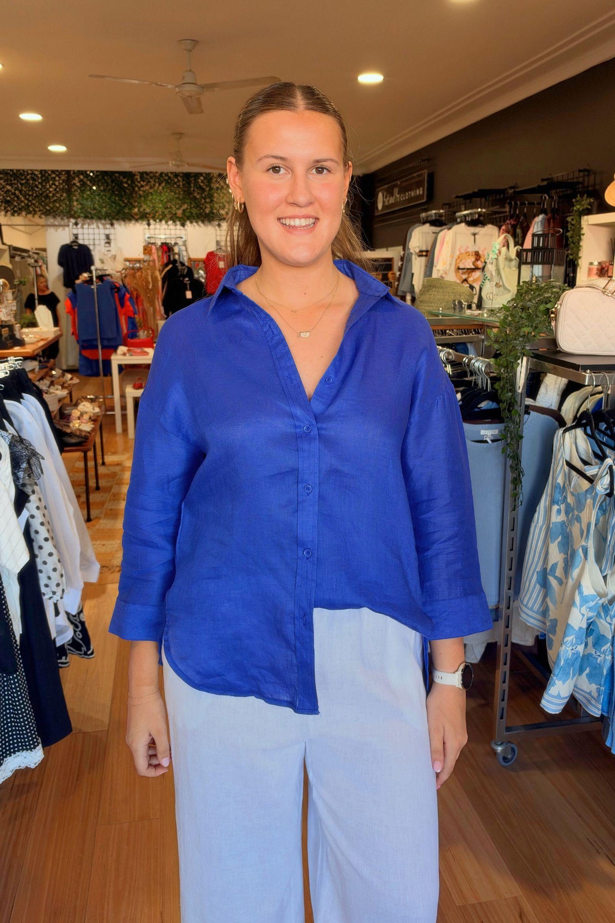 Little Lies Boyfriend Shirt in Cobalt front close-up showing the open collar and button front