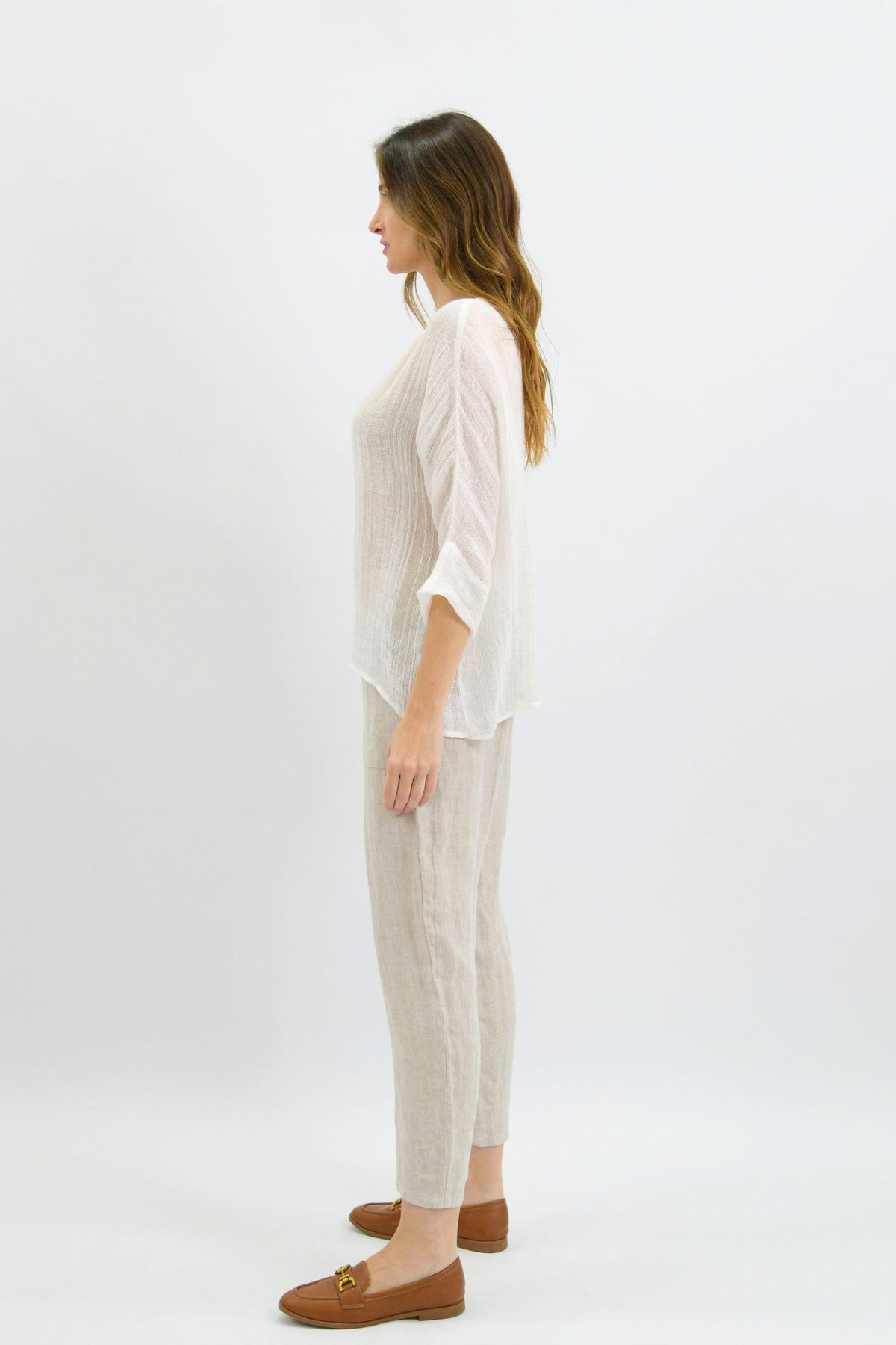 Nola Italian Linen Top - White by Worthier — full-length side view showing the top’s relaxed shape, styled with light trousers in Australia at Kat and Ko Clothing.
