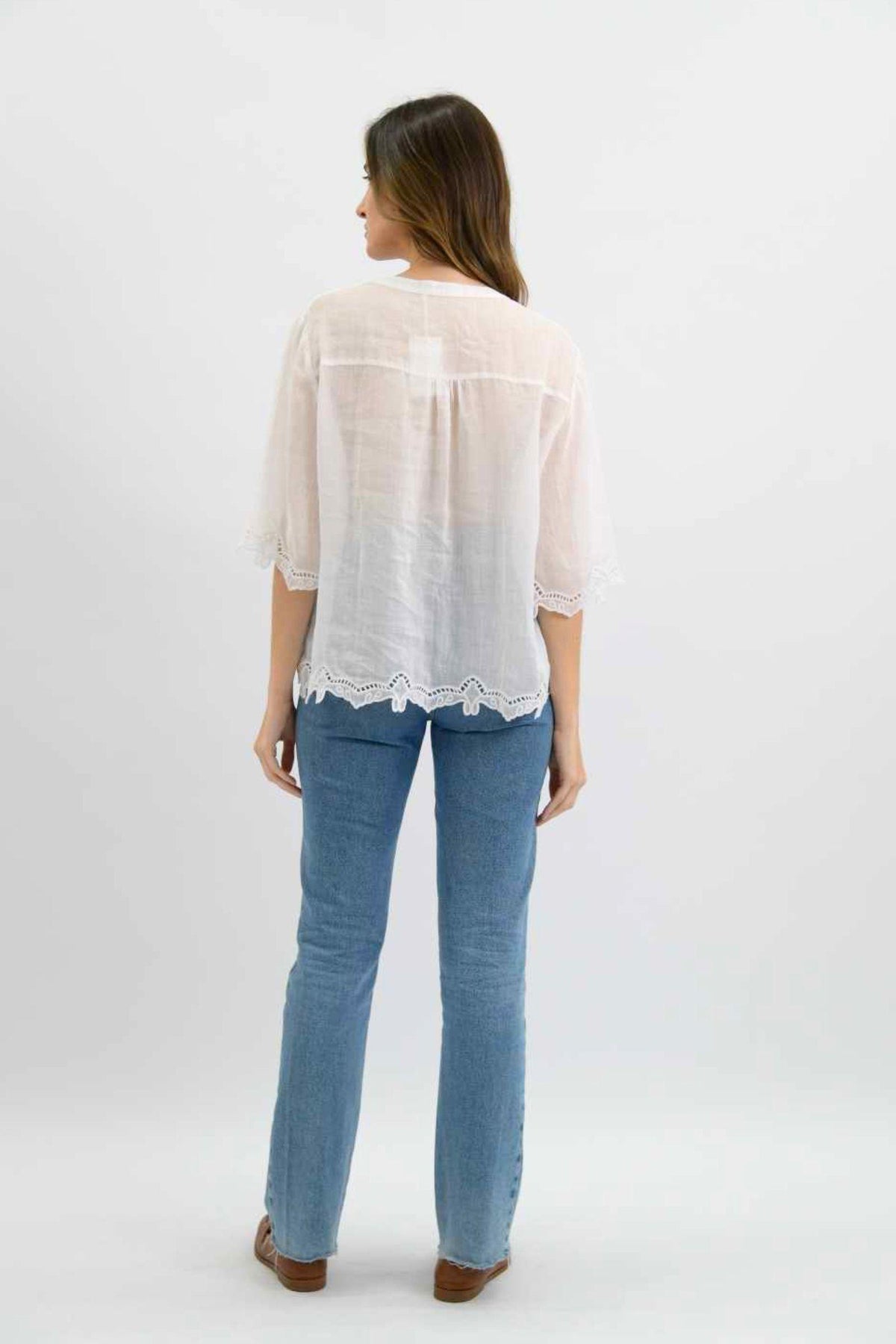Worthier Tansy Linen Top in White back view showing the sheer linen and scalloped lace hem