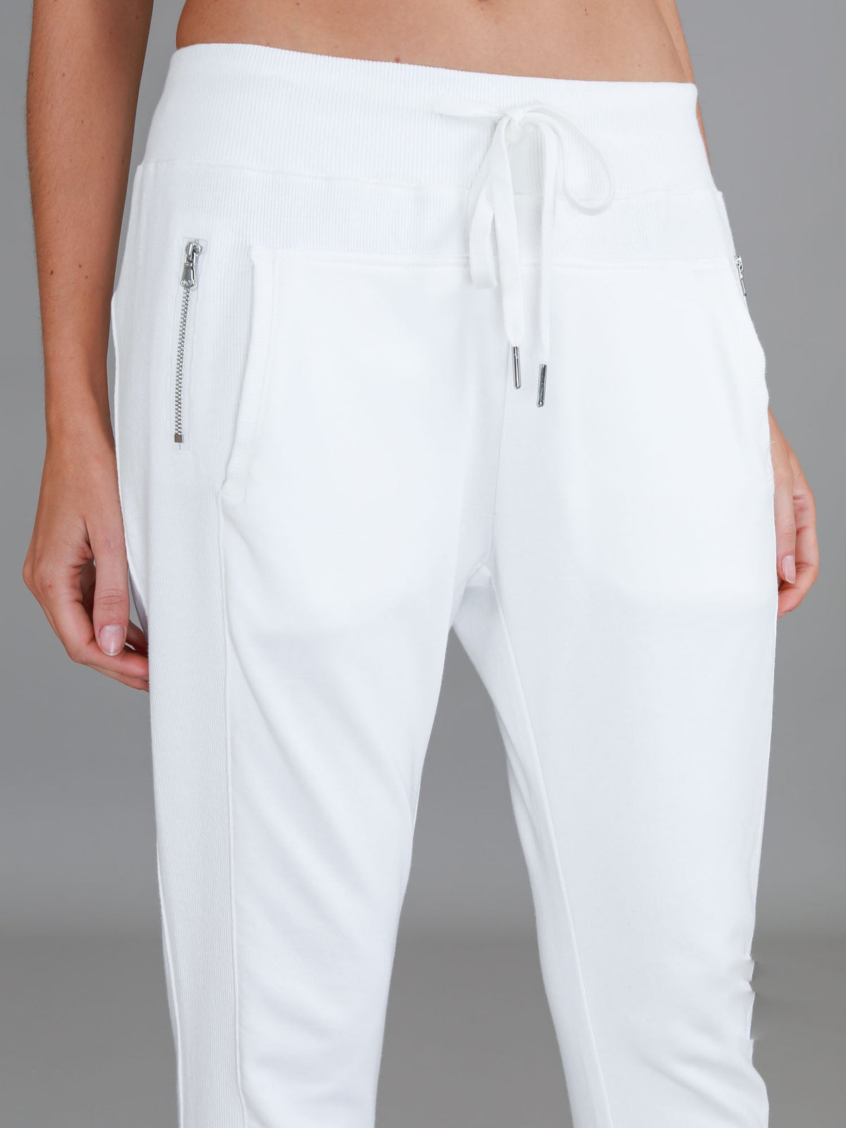 3rd Story The Label Byron Jogger White — close-up detail of the drawstring waistband and silver chain zip pocket on the white cotton French Terry jogger, shop in Australia at Kat and Ko Clothing