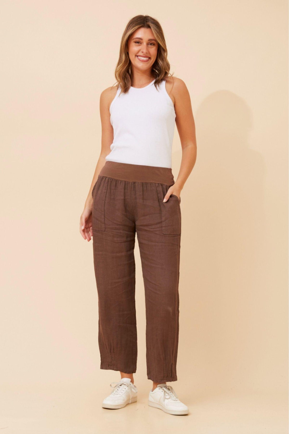 Bottega Moda Sorrento Linen Pants in Chocolate full-length front view with a white tank and sneakers