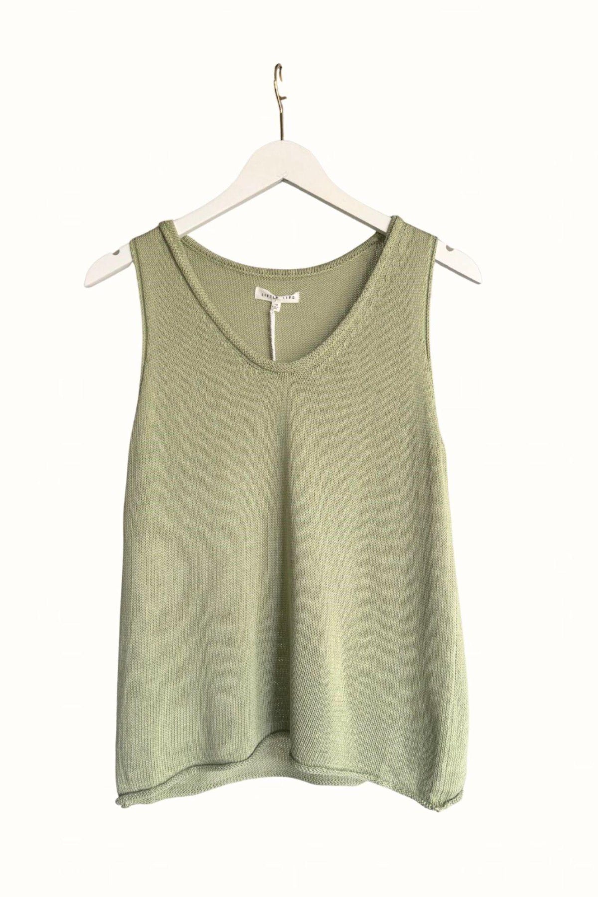 Little Lies Scoop Spring Tank in Sage front view on a hanger, showing the scoop neckline and rolled-edge hem