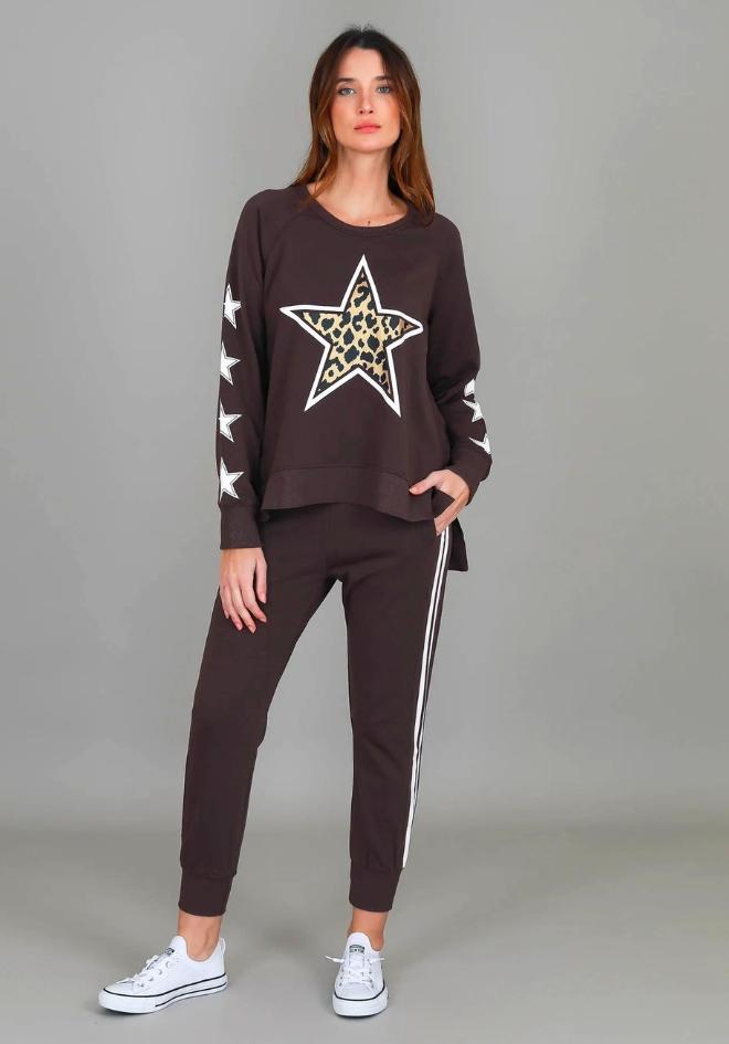 3rd Story The Label Kate Leopard Star Sweater Truffle — full-length front view of oversized truffle sweatshirt with leopard star motif and star-print raglan sleeves, styled as a matching set with truffle stripe joggers and white sneakers, shop in Australia at Kat and Ko Clothing
