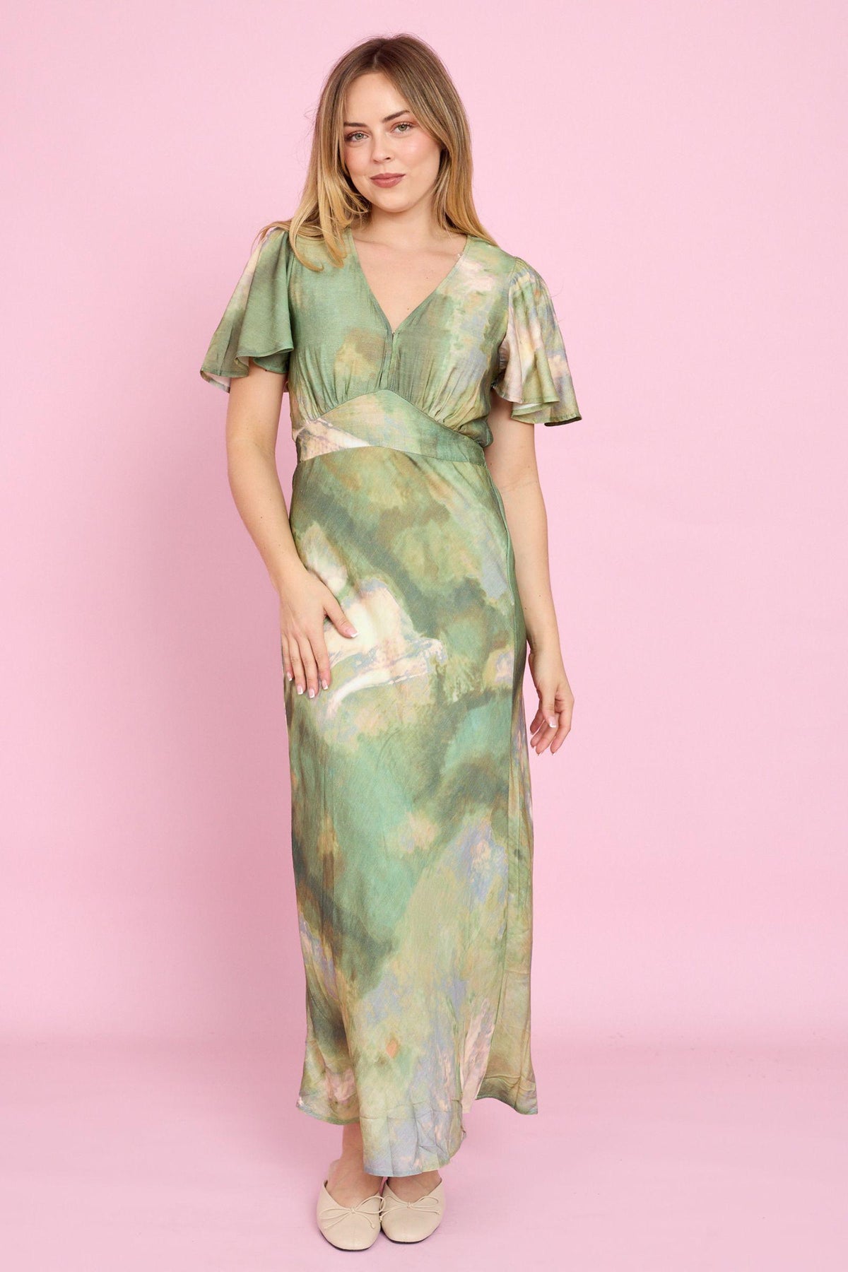Fria The Label Dune Print Midi Dress in Sage front view showing the V-neckline and flutter sleeves