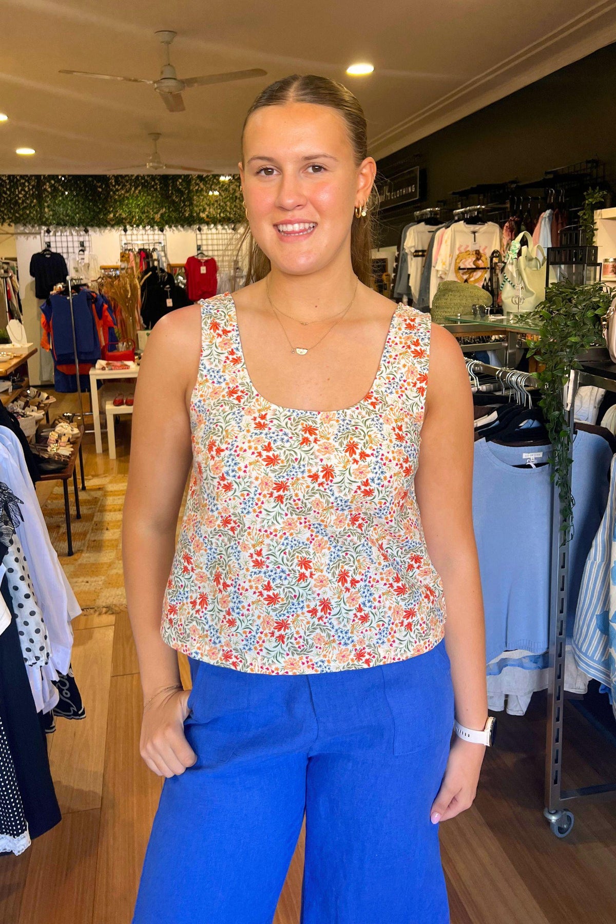 Little Lies Margot Cami in floral print front view, worn with cobalt wide-leg linen pants