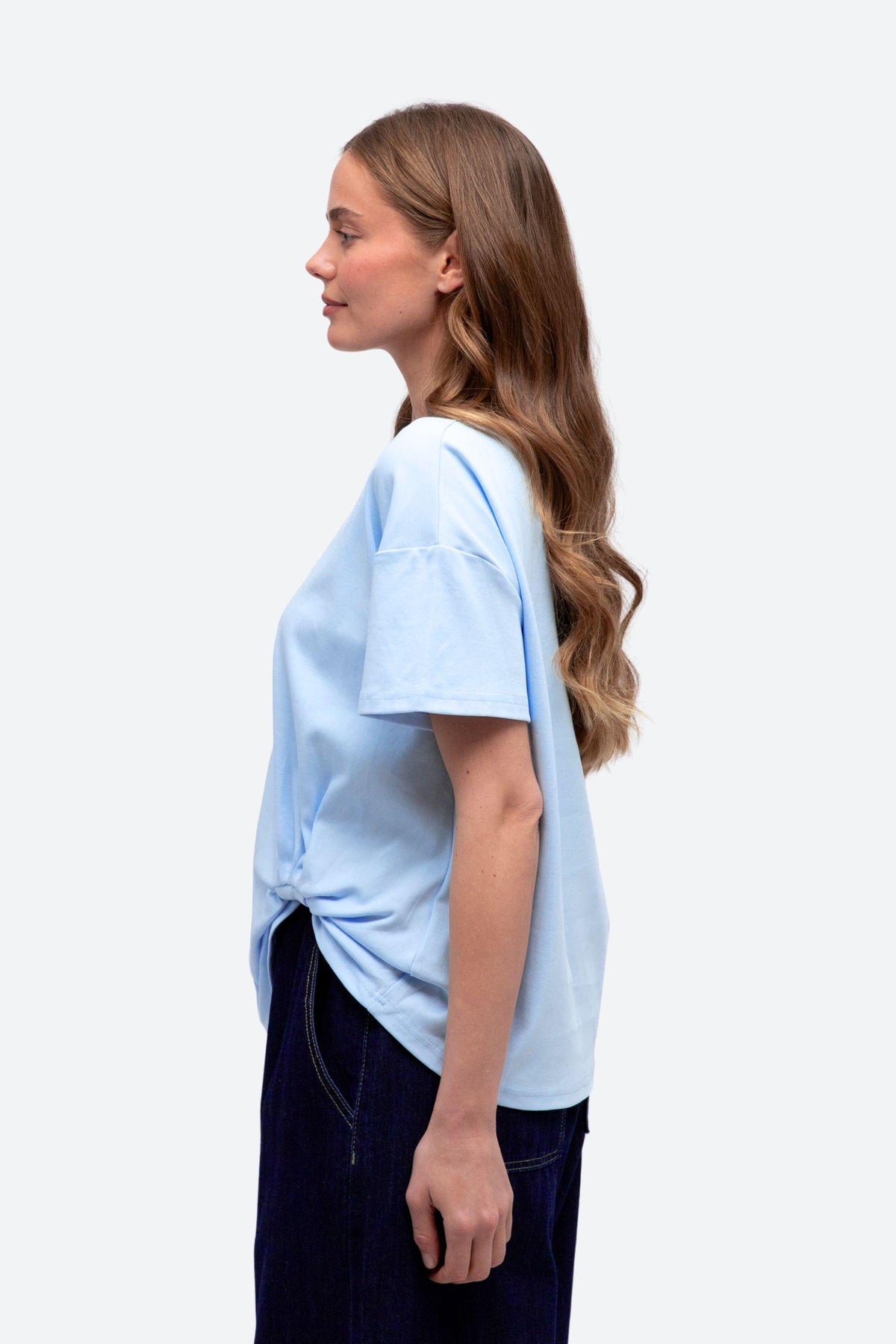 Label of Love Easy Tuck Tee in Light Blue, side view showing the relaxed fit