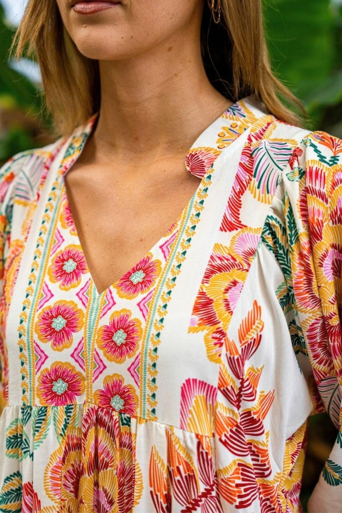 Boho Australia Marwa Dress — close-up of the colourful spliced print, band collar, V-neckline and front bodice yoke detail, available in Australia at Kat and Ko Clothing