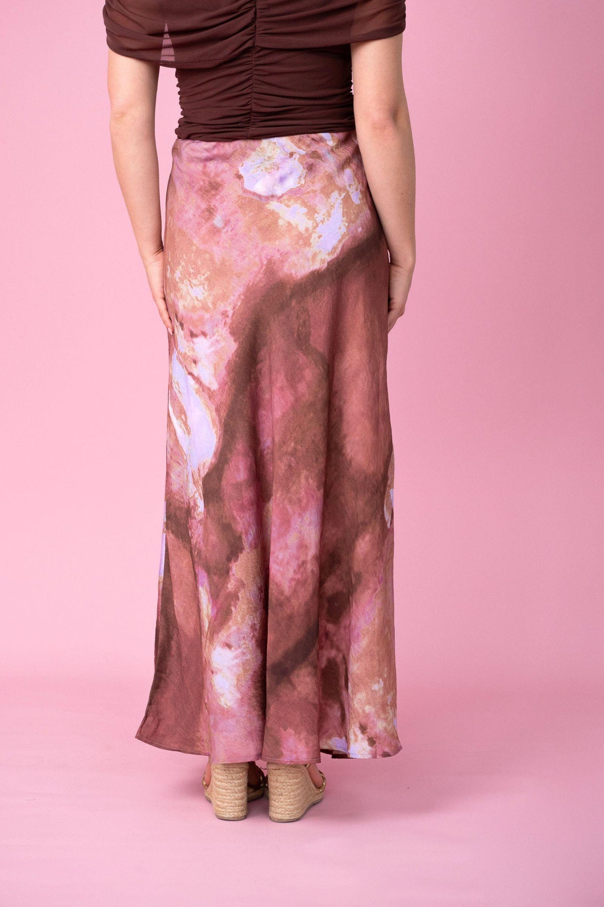 Fria The Label Dune Print Maxi Skirt in Rose back view from the waist down