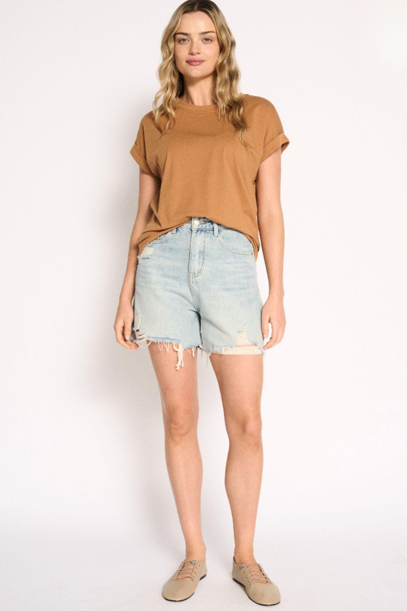 Rhodes Tee in Desert by Little Lies — relaxed crew neck cotton tee in desert tan, styled with denim shorts, available in Australia at Kat and Ko Clothing