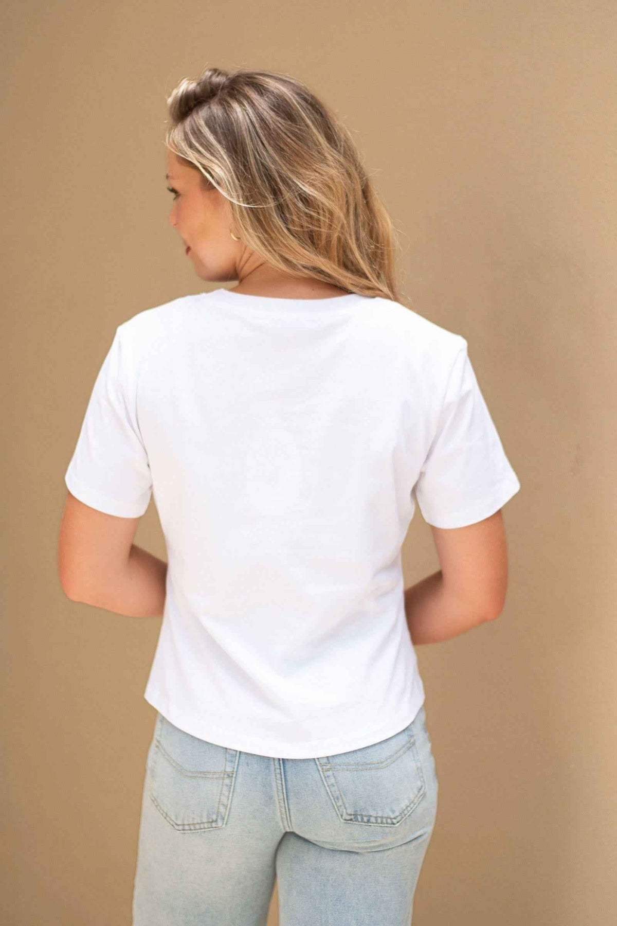 Fria The Label Ellery Ring Detail Tee in White back view showing the curved hem