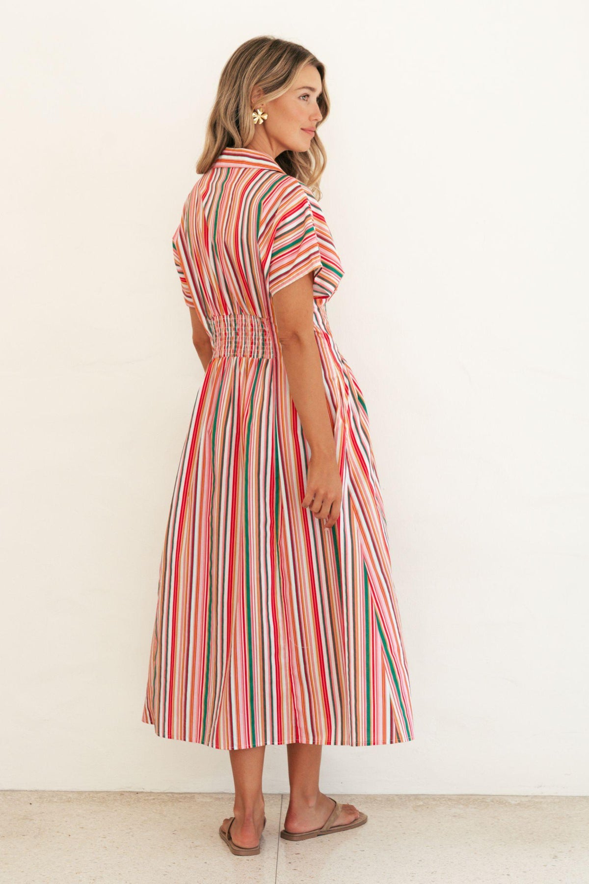 Label of Love Bella Stripe Midi Dress back view with gathered waist and midi-length skirt