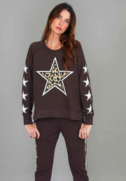 Kate Leopard Star Sweater in Truffle by 3rd Story The Label — cropped front view of truffle French Terry sweatshirt with leopard print star graphic and white star sleeve accents, styled with matching truffle joggers, available in Australia at Kat and Ko Clothing