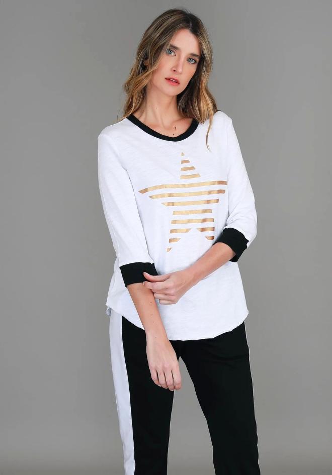 Sammie 3/4 Star T Shirt by 3rd Story The Label — cropped front view of white cotton jersey tee with gold metallic star print and contrast black neckline and cuffs, styled with black joggers, available in Australia at Kat and Ko Clothing