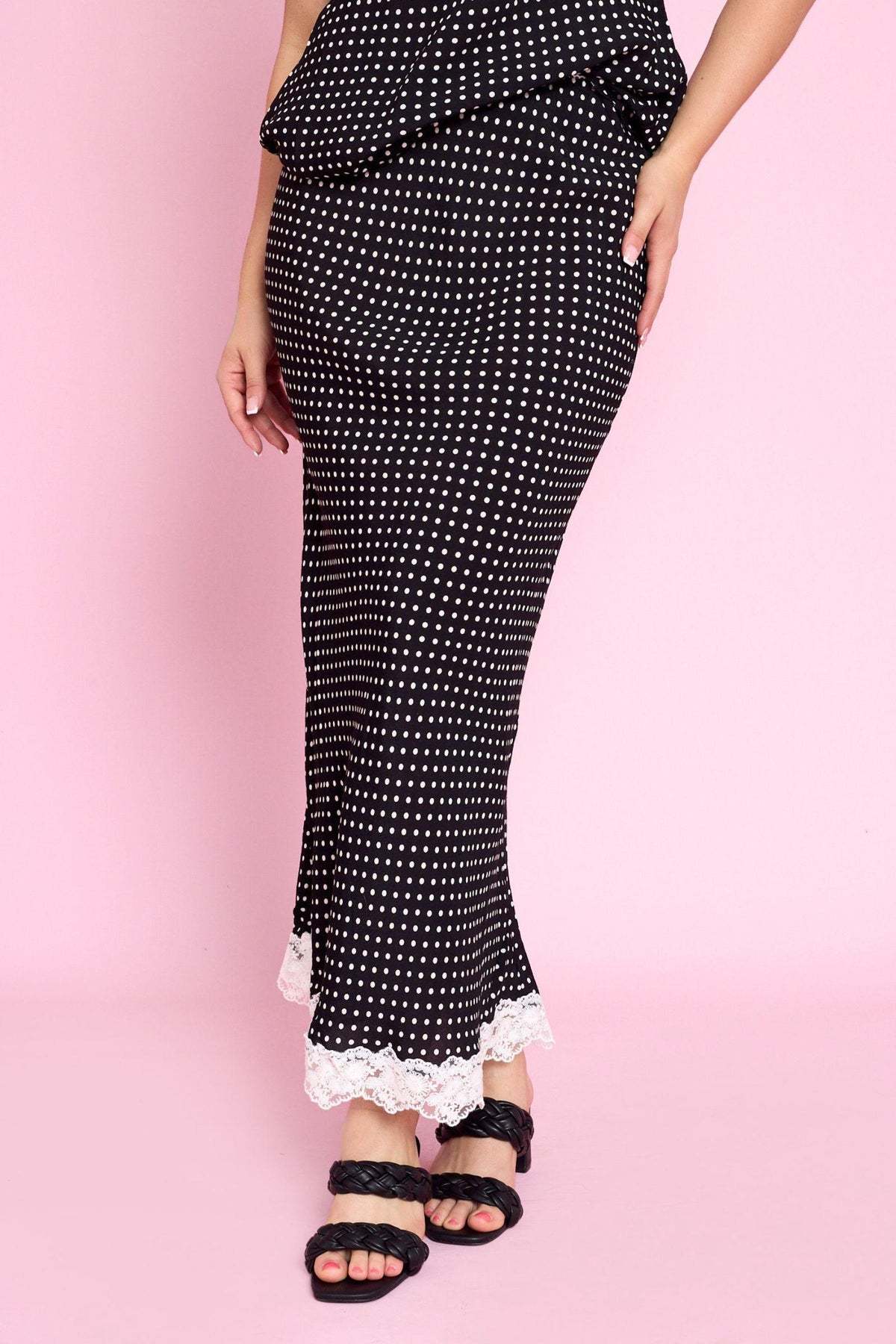 Fria The Label Vivienne Skirt in Black and White, bias-cut maxi with white lace trim hem, front view
