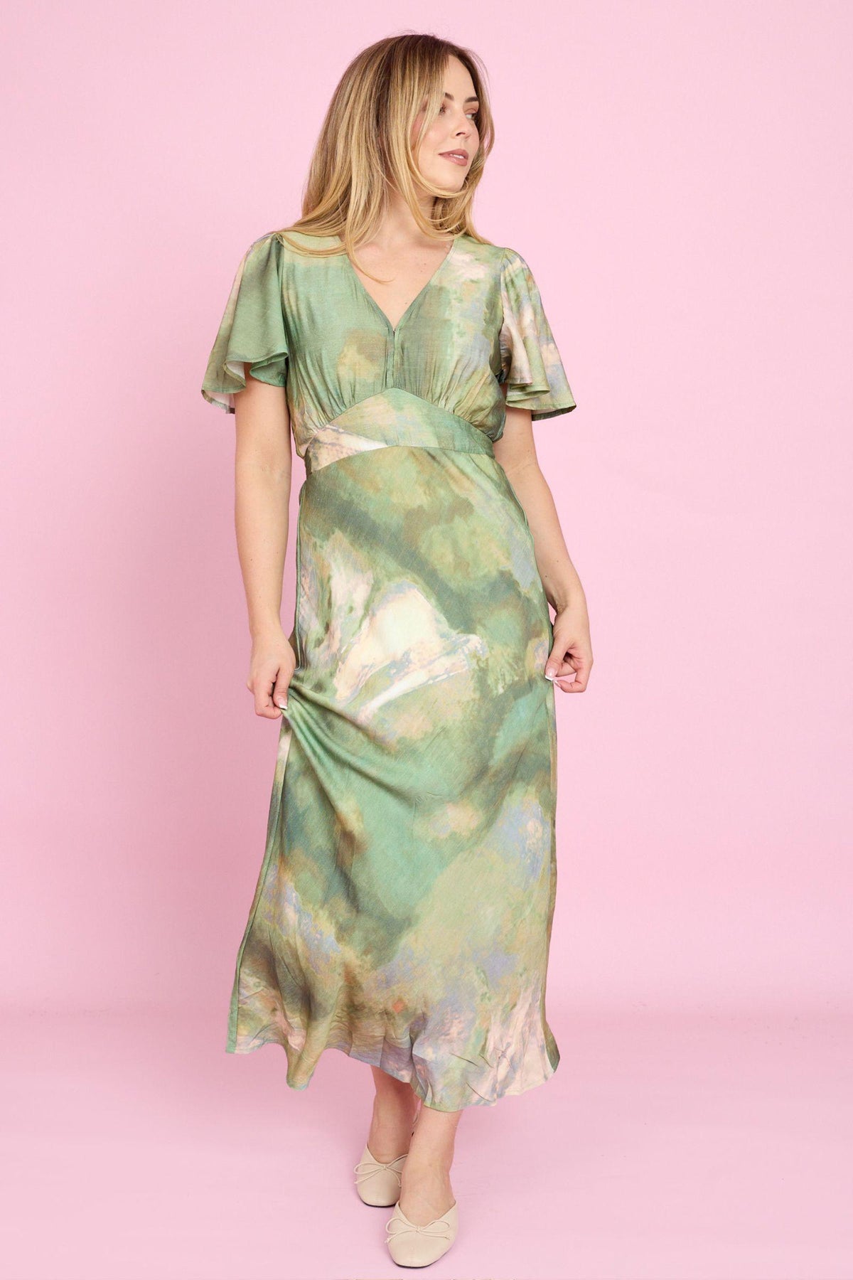 Fria The Label Dune Print Midi Dress in Sage full-length front view in motion, showing the cinched waist