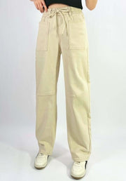 Orlando Barrel Jeans in Sand by Country Denim — front view of sand wide-leg barrel jeans with elasticated drawstring waist and large front patch pockets, styled with white sneakers, available in Australia at Kat and Ko Clothing