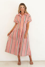 Label of Love Bella Stripe Midi Dress full-length front view, model holding out the flared skirt, with tan sandals