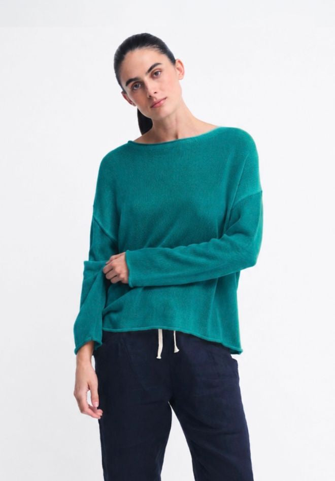 Spring Knit - Teal by Little Lies — close-up front view of teal lightweight knit with round neckline and rolled hem, styled with navy pants, available in Australia at Kat and Ko Clothing
