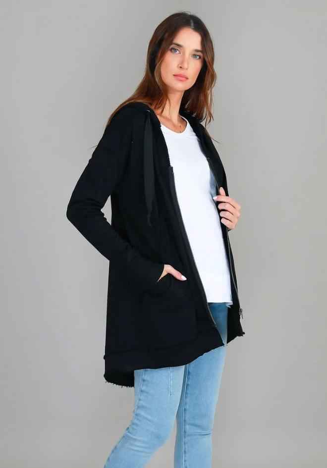3rd Story The Label Charlie Jacket in Black — side view of open longline hooded jacket with kangaroo pocket, styled with a white tee and light denim jeans, shop in Australia at Kat and Ko Clothing