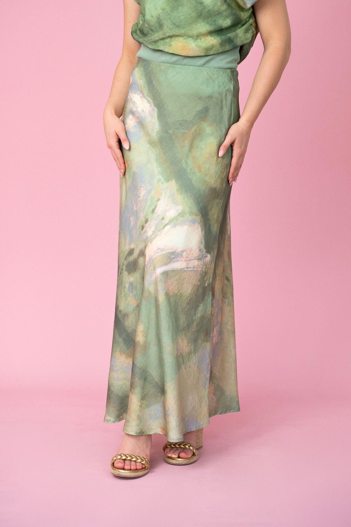 Fria The Label Dune Print Maxi Skirt in Sage front view showing the maxi length and tie-dye print