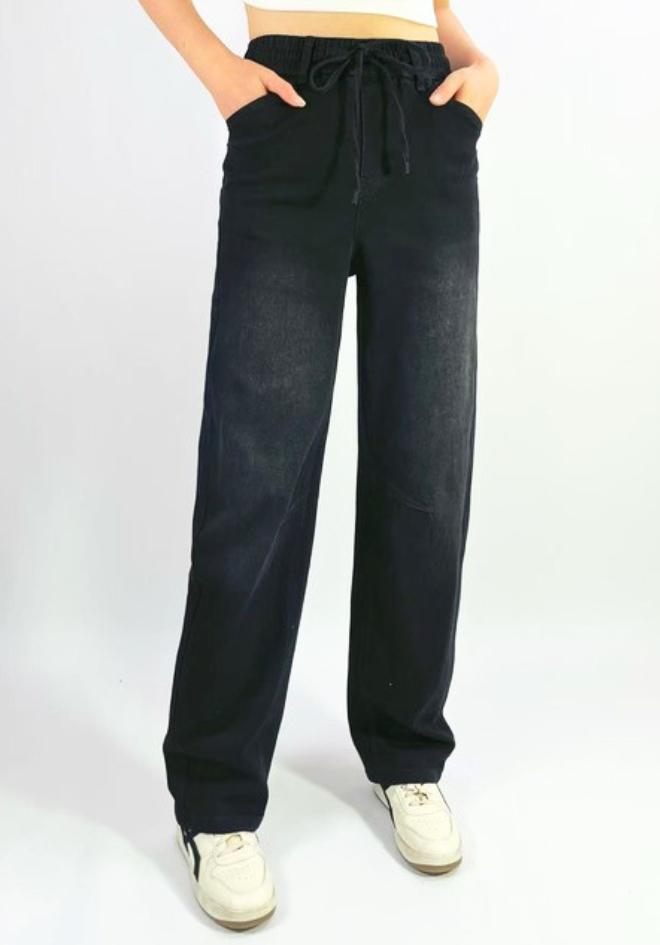 Orlando Barrel Jeans in Black by Country Denim — front view of black wide-leg barrel jeans with elasticated drawstring waist and front patch pockets, styled with white sneakers, available in Australia at Kat and Ko Clothing
