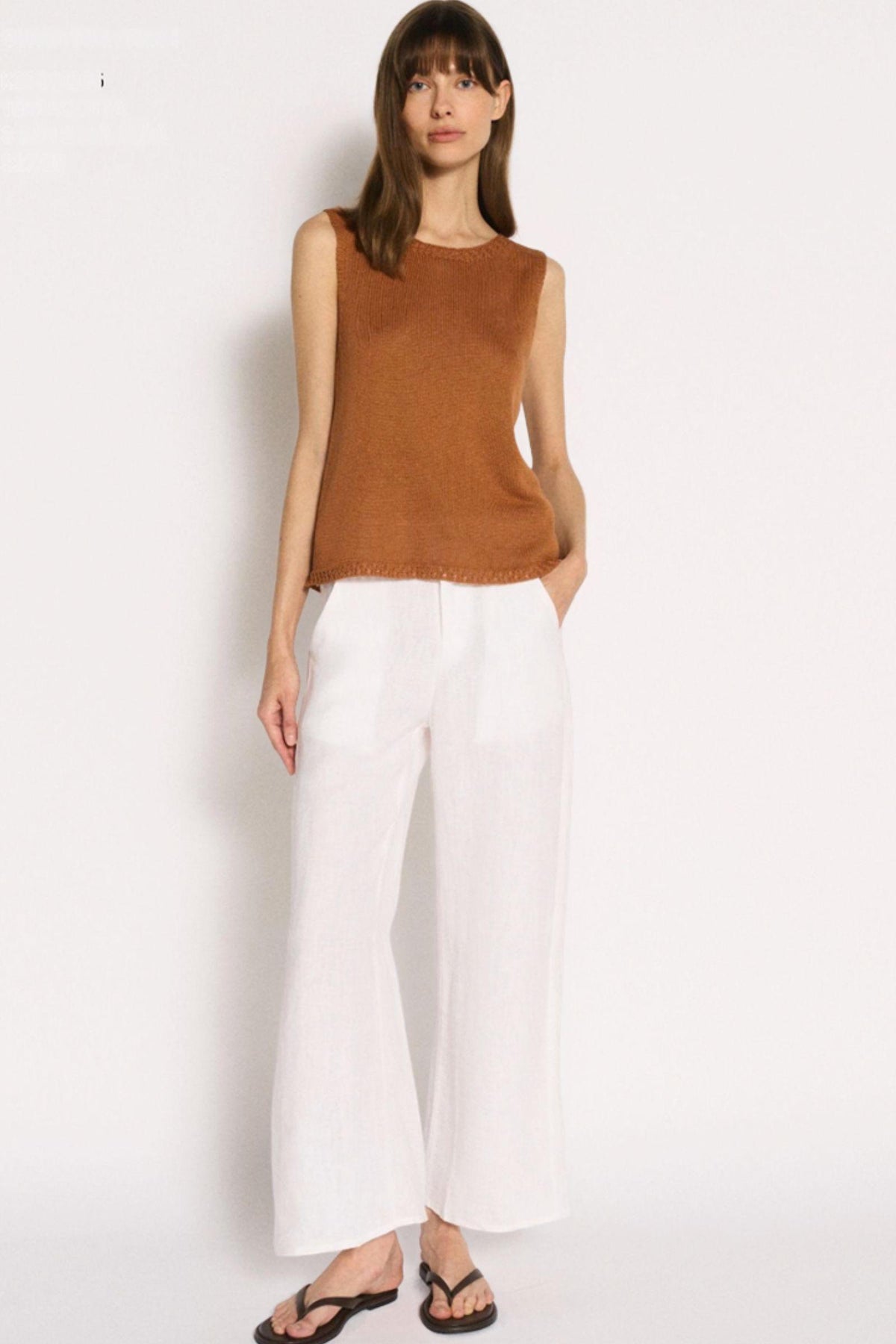 Little Lies Olivia Trim Tank in Terracotta full-length front view with white wide-leg pants and sandals