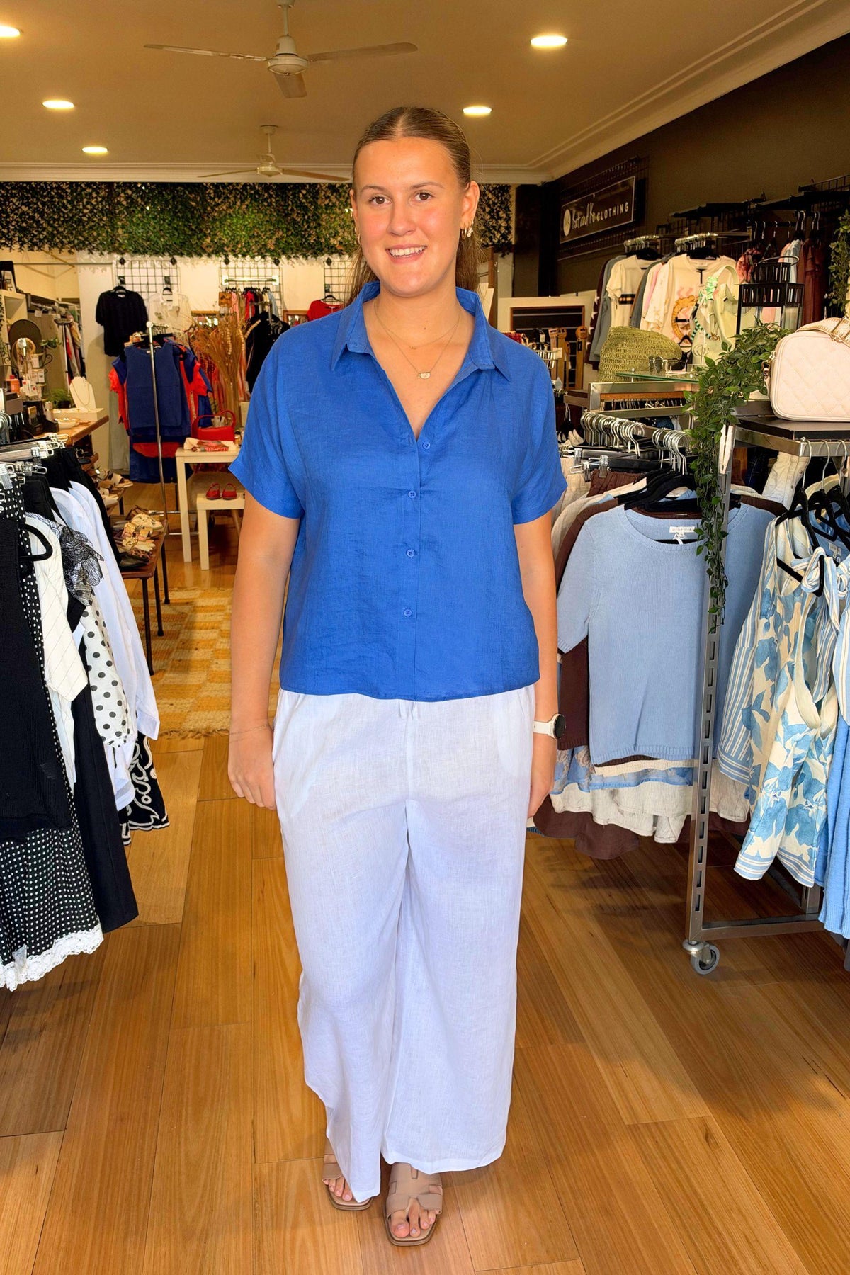 Little Lies Bronte Shirt in Cobalt full-length front view styled with white wide-leg linen pants