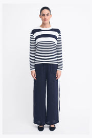 Monaco Pants by Little Lies — full-length view of navy wide-leg pants with white side stripes, styled with a navy and white striped top, available in Australia at Kat and Ko Clothing.