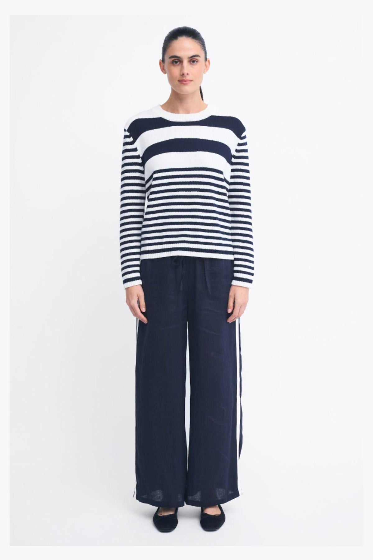 Monaco Pants by Little Lies — full-length view of navy wide-leg pants with white side stripes, styled with a navy and white striped top, available in Australia at Kat and Ko Clothing.
