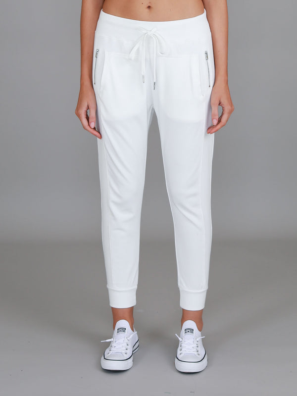 3rd Story The Label Byron Jogger White — full-length front view of white cotton French Terry jogger with drawstring waist and silver zip pockets, styled with white sneakers, shop in Australia at Kat and Ko Clothing