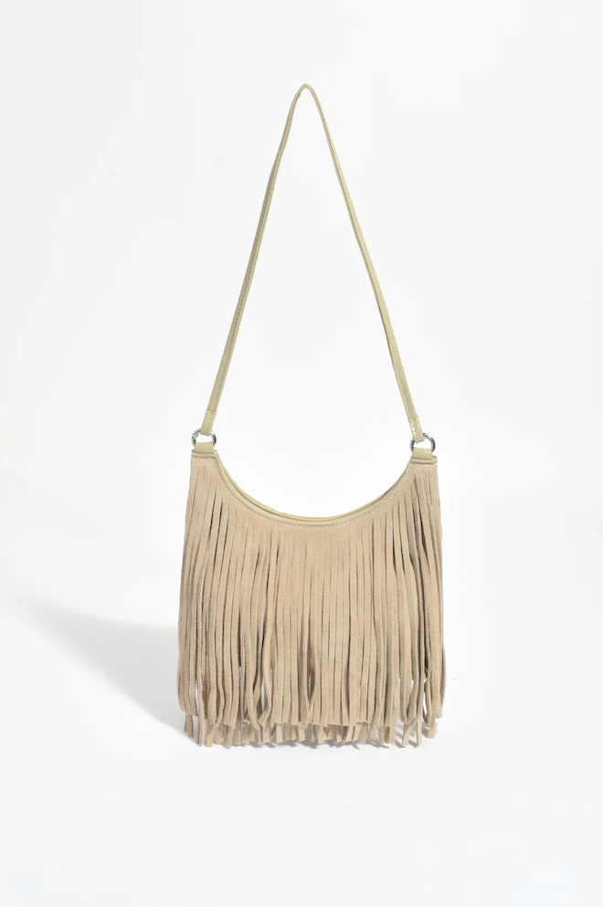 Beige fringe handbag on a white background