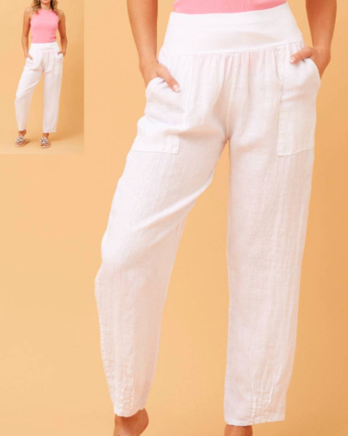 Bottega Moda Sorrento Linen Pants — side view showing the white linen fabric and tapered ankle, styled with a pink top, available in Australia at Kat and Ko Clothing