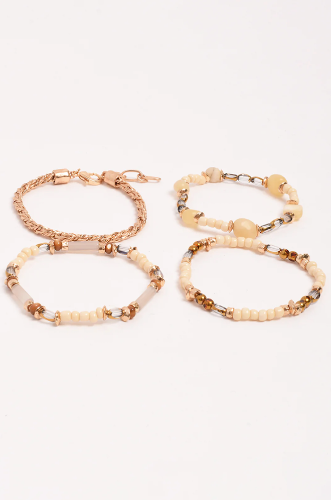 Set of beaded bracelets on a white background