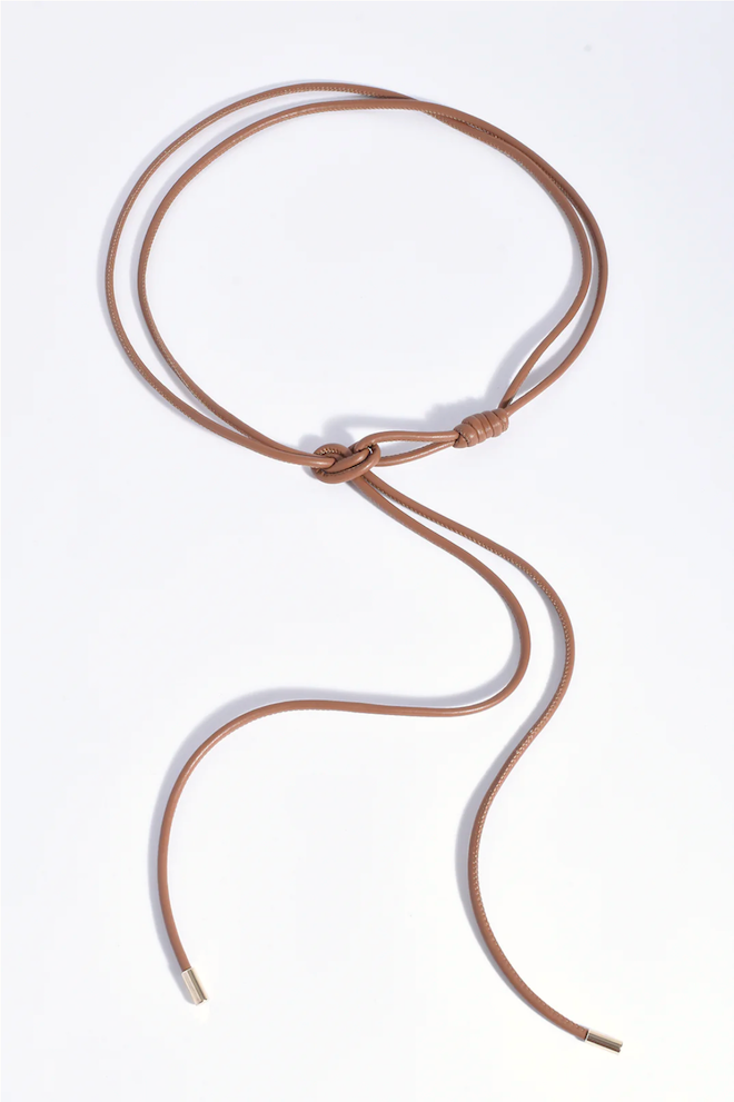 Brown leather necklace on a white background