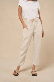 Luxe Pants in Natural by Little Lies — relaxed wide-leg trousers in a neutral tone, perfect for everyday styling